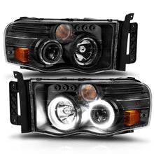 Cargar imagen en el visor de la galería, ANZO 2002-2005 Dodge Ram 1500 Projector Headlights w/ Halo Black Clear Amber