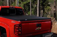 Load image into Gallery viewer, Lund 15-17 Chevy Silverado 3500 Fleetside (6.6ft. Bed) Hard Fold Tonneau Cover - Black