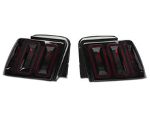 Load image into Gallery viewer, Raxiom 99-04 Ford Mustang Excluding 99-01 Cobra Icon LED Tail Lights- Black Housing (Smoked Lens)