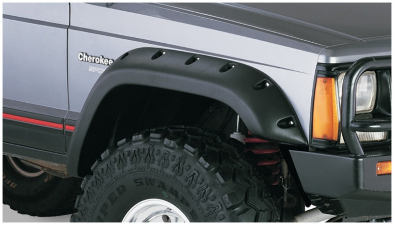 Guardabarros estilo recortado Bushwacker 84-01 para Jeep Cherokee, 4 piezas, apto solo para utilitarios deportivos de 4 puertas, color negro