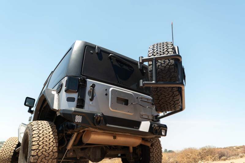 DV8 07-18 Jeep Wrangler JK Body Mounted Tire Carrier