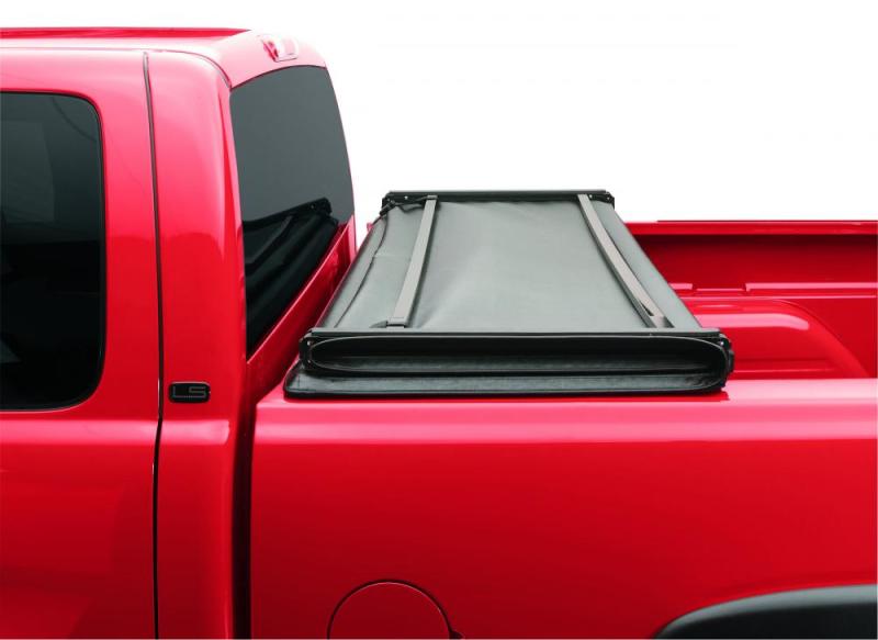 Cubierta de lona plegable triple Genesis para Toyota Tacoma (caja de 5 pies) Lund 16-23, color negro