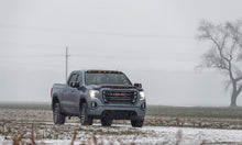 Cargar imagen en el visor de la galería, AVS 19-22 GMC Sierra 1500 Low Profile Aeroskin Lightshield Pro - Black