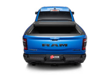 Cargar imagen en el visor de la galería, BAK 19-21 Dodge Ram w/ Ram Box Revolver X4s 5.7ft Bed Cover (New Body Style 1500 Only)