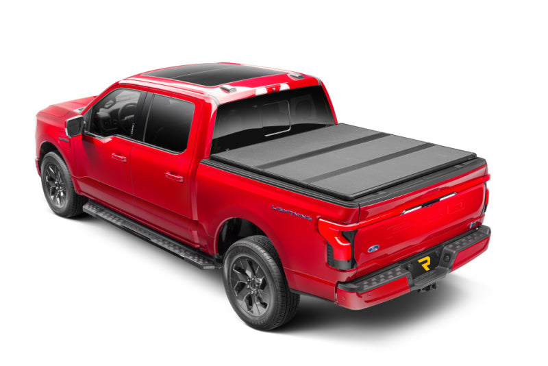 Extang 21-23 Ford F-150 (caja de 5 pies y 7 pulgadas) ALX plegable sólida