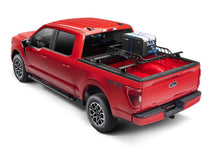 Load image into Gallery viewer, Roll-N-Lock 21-22 Ford F150 (w/o OE Cargo Tracks - 67.1in Bed) M-Series XT Retractable Tonneau Cover