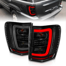 Cargar imagen en el visor de la galería, ANZO 1999-2004 Jeep Grand Cherokee LED Tail Lights w/ Light Bar Black Housing Smoke Lens