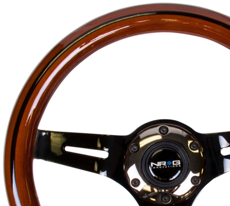 Volante NRG Classic Wood Grain (310 mm), incrustaciones de madera oscura y línea negra con centro de 3 radios cromado negro.