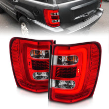 Cargar imagen en el visor de la galería, ANZO 1999-2004 Jeep Grand Cherokee LED Tail Lights w/ Light Bar Chrome Housing Red/Clear Lens