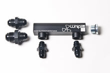 Load image into Gallery viewer, Radium Engineering Universal 4-Port Manifold - Black W/ Logo