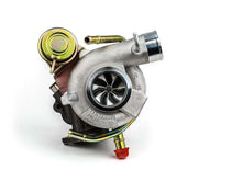 Cargar imagen en el visor de la galería, Forced Performance Subaru STi/WRX Blue Turbocharger 58mm CH8 CM Turbine Hsg Internal WG w/Oil Line