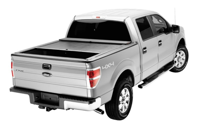 Cubierta retráctil Roll-N-Lock para caja de camioneta Ford F-150 XSB de 67 pulgadas, serie M, 09-14