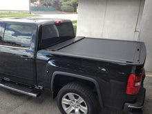 Load image into Gallery viewer, Roll-N-Lock 15-18 Ford F-150 XSB 65-5/8in M-Series Retractable Tonneau Cover