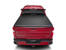 Load image into Gallery viewer, Lund 99-07 Chevy Silverado 1500 (6.5ft. Bed) Genesis Tri-Fold Tonneau Cover - Black