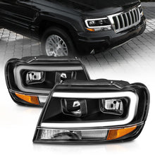 Cargar imagen en el visor de la galería, ANZO 99-04 Jeep Grand Cherokee Crystal Headlights - w/ Light Bar Black Housing